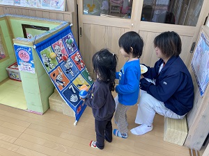 ライオンズ的当てをする父と子